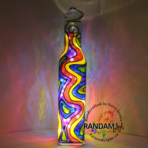 Abstract lines of fuchsia, yellow, lime, amethyst and blue. Painted bottle light,