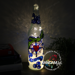 Nova Scotia Home Light bottle. Its comforting glow acts as a guiding light, leading those who yearn for home on a cherished journey back to familiar shores.