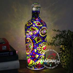 A painted bottle light showcases an alluring abstract paisley design